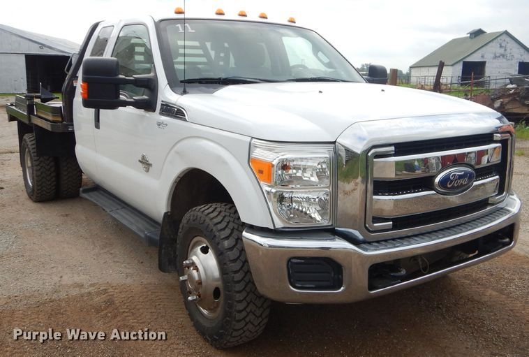 image for item ED9346 2011 Ford F350 SuperCab bale bed pickup truck