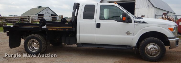 image for item ED9346 2011 Ford F350 SuperCab bale bed pickup truck