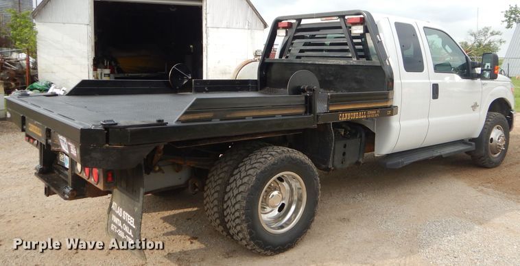 image for item ED9346 2011 Ford F350 SuperCab bale bed pickup truck