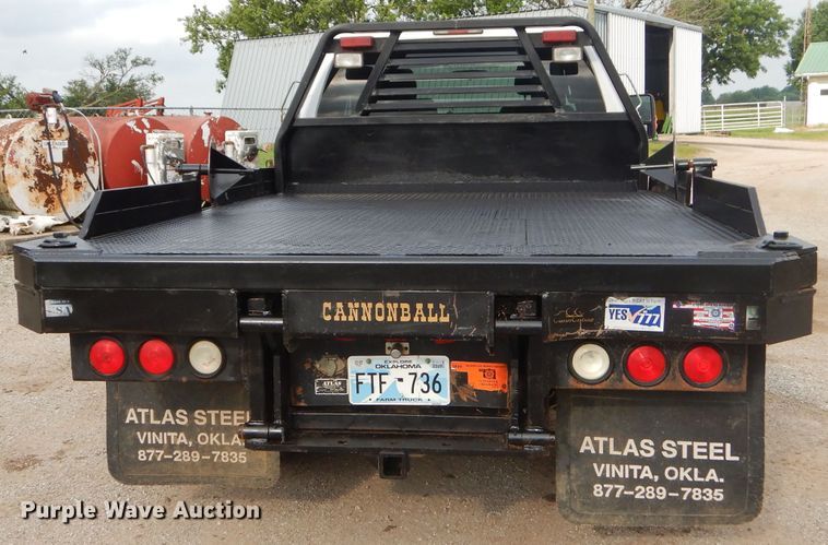 image for item ED9346 2011 Ford F350 SuperCab bale bed pickup truck