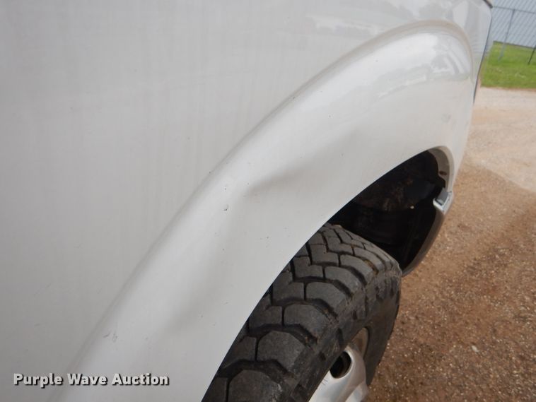 image for item ED9346 2011 Ford F350 SuperCab bale bed pickup truck