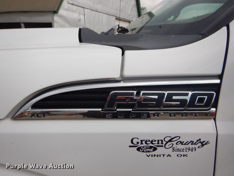 image for item ED9346 2011 Ford F350 SuperCab bale bed pickup truck