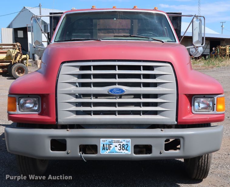 image for item FE9687 1995 Ford F700 dump flatbed truck