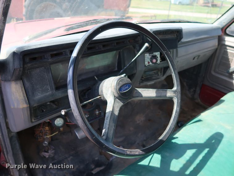 image for item FE9687 1995 Ford F700 dump flatbed truck