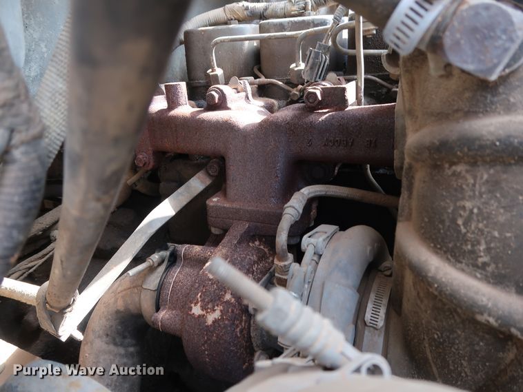 image for item FE9687 1995 Ford F700 dump flatbed truck