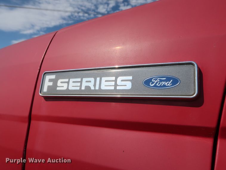 image for item FE9687 1995 Ford F700 dump flatbed truck