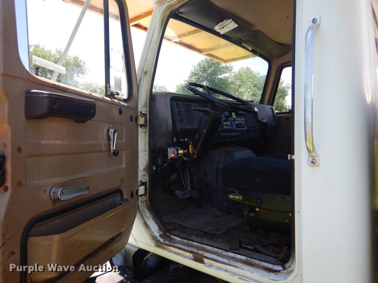 image for item FT9603 1985 International 2574 truck with Big John tree transplanter