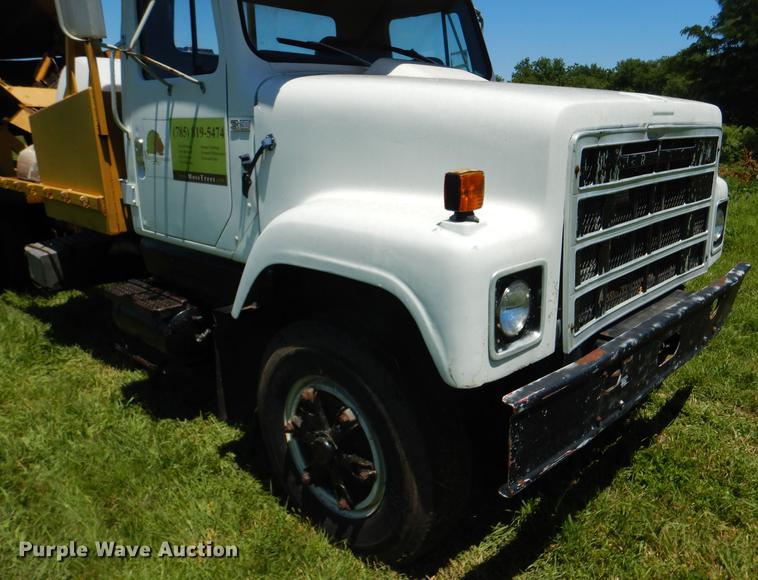image for item FT9603 1985 International 2574 truck with Big John tree transplanter
