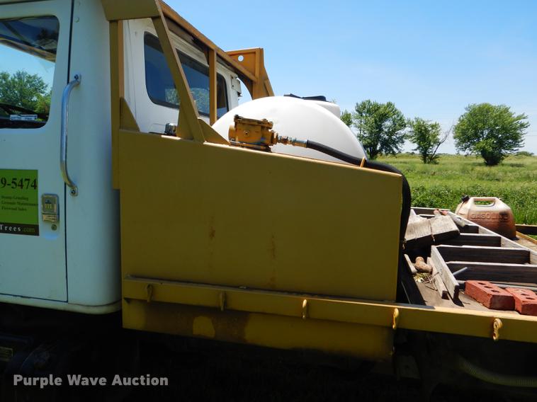 image for item FT9603 1985 International 2574 truck with Big John tree transplanter