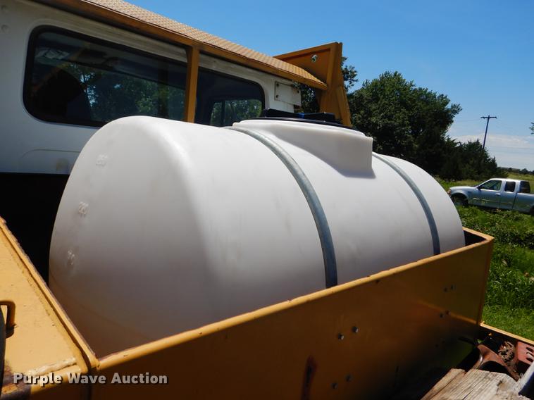 image for item FT9603 1985 International 2574 truck with Big John tree transplanter