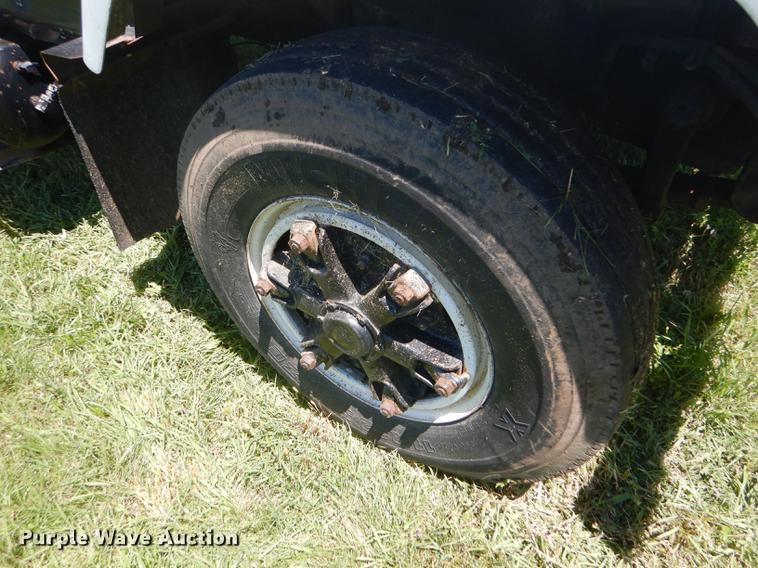 image for item FT9603 1985 International 2574 truck with Big John tree transplanter