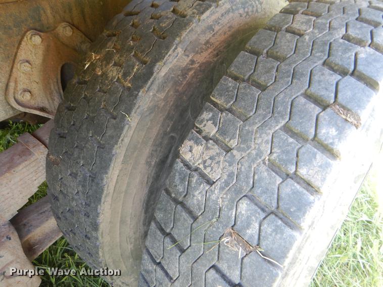 image for item FT9603 1985 International 2574 truck with Big John tree transplanter