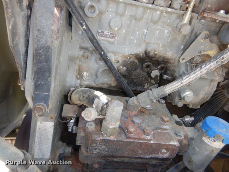 image for item DE3521 1997 Ford F800 utility bed truck with crane