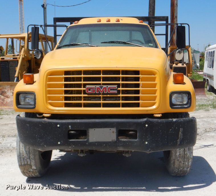 image for item DE3530 1997 GMC C7500 flatbed truck