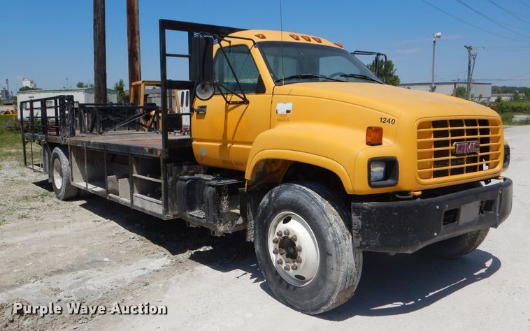 image for item DE3530 1997 GMC C7500 flatbed truck