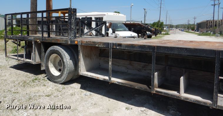 image for item DE3530 1997 GMC C7500 flatbed truck