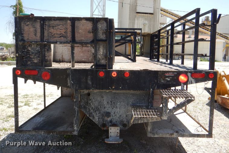 image for item DE3530 1997 GMC C7500 flatbed truck