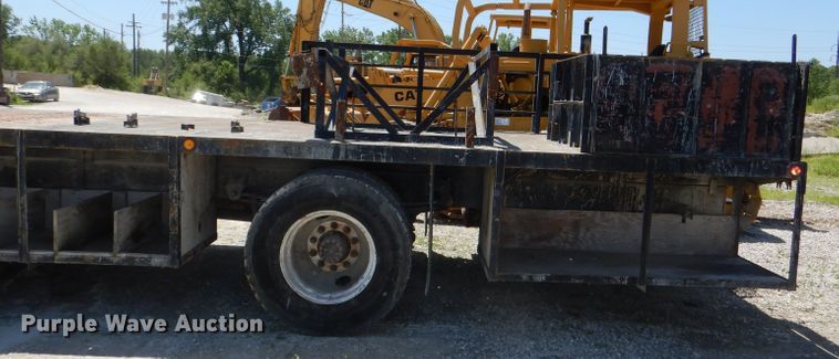 image for item DE3530 1997 GMC C7500 flatbed truck