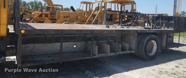 image for item DE3530 1997 GMC C7500 flatbed truck