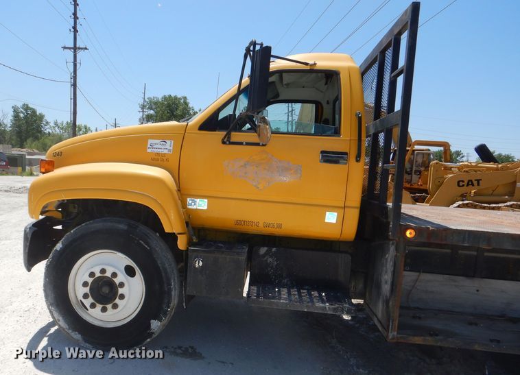 image for item DE3530 1997 GMC C7500 flatbed truck