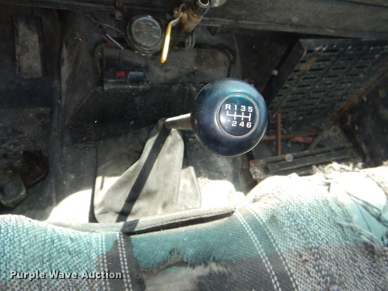 image for item DE3530 1997 GMC C7500 flatbed truck