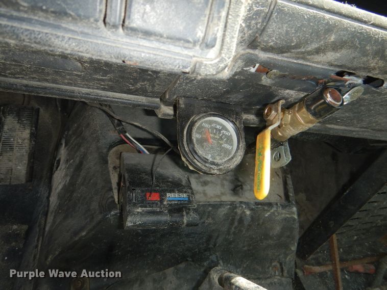 image for item DE3530 1997 GMC C7500 flatbed truck