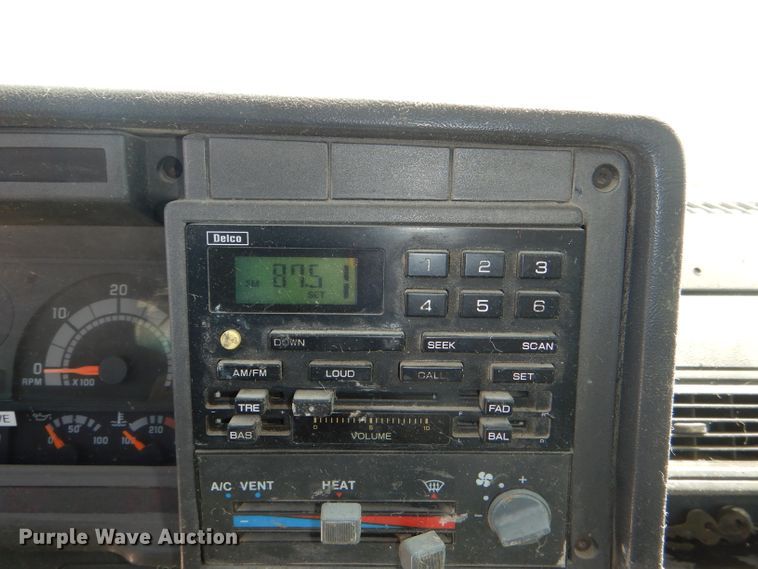 image for item DE3530 1997 GMC C7500 flatbed truck