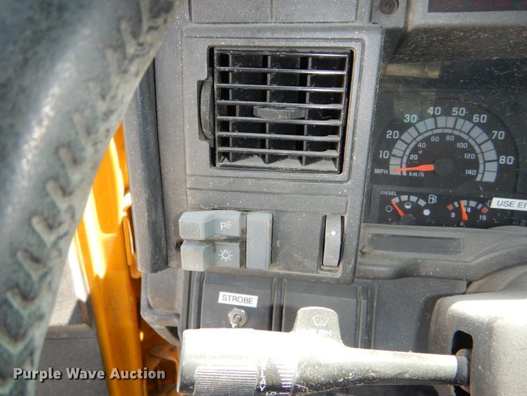 image for item DE3530 1997 GMC C7500 flatbed truck