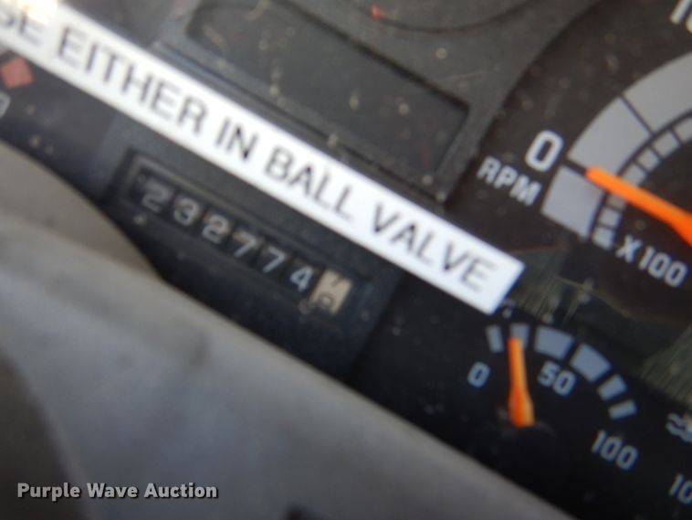 image for item DE3530 1997 GMC C7500 flatbed truck