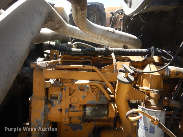 image for item DE3530 1997 GMC C7500 flatbed truck