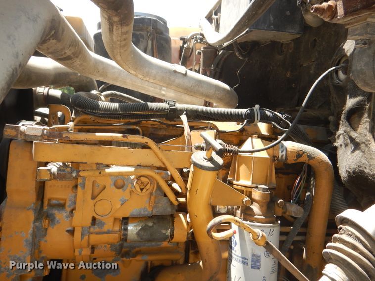 image for item DE3530 1997 GMC C7500 flatbed truck