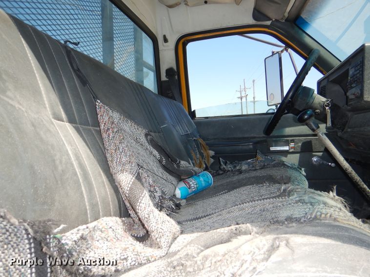 image for item DE3530 1997 GMC C7500 flatbed truck