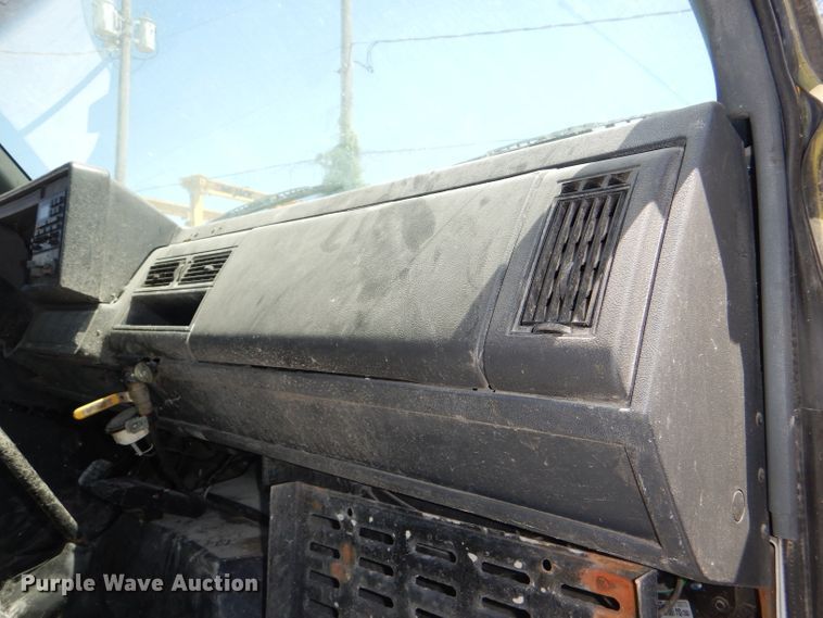 image for item DE3530 1997 GMC C7500 flatbed truck