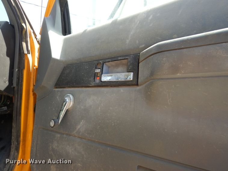 image for item DE3530 1997 GMC C7500 flatbed truck