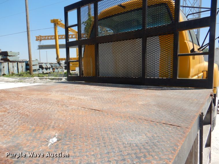 image for item DE3530 1997 GMC C7500 flatbed truck