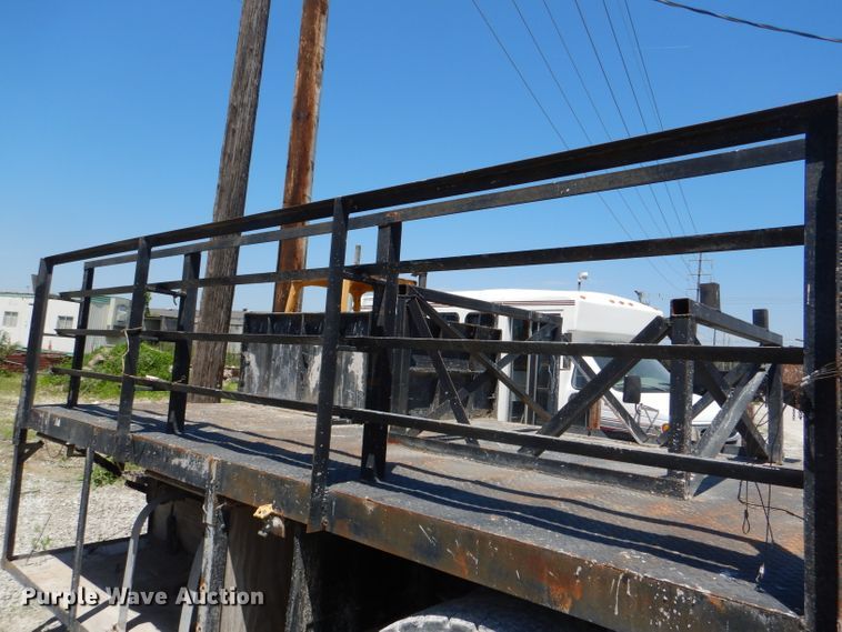 image for item DE3530 1997 GMC C7500 flatbed truck