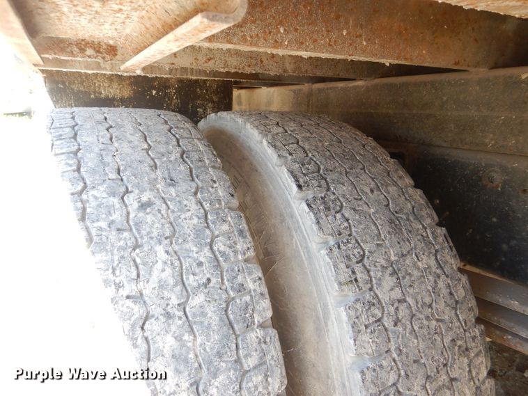 image for item DE3530 1997 GMC C7500 flatbed truck