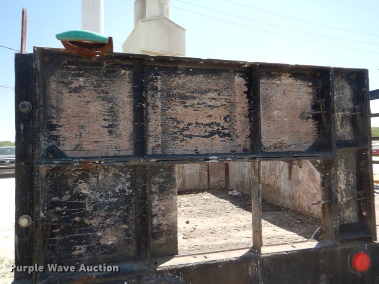 image for item DE3530 1997 GMC C7500 flatbed truck