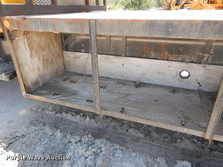 image for item DE3530 1997 GMC C7500 flatbed truck