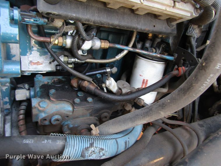 image for item DG1280 2000 International 4900 chipper truck