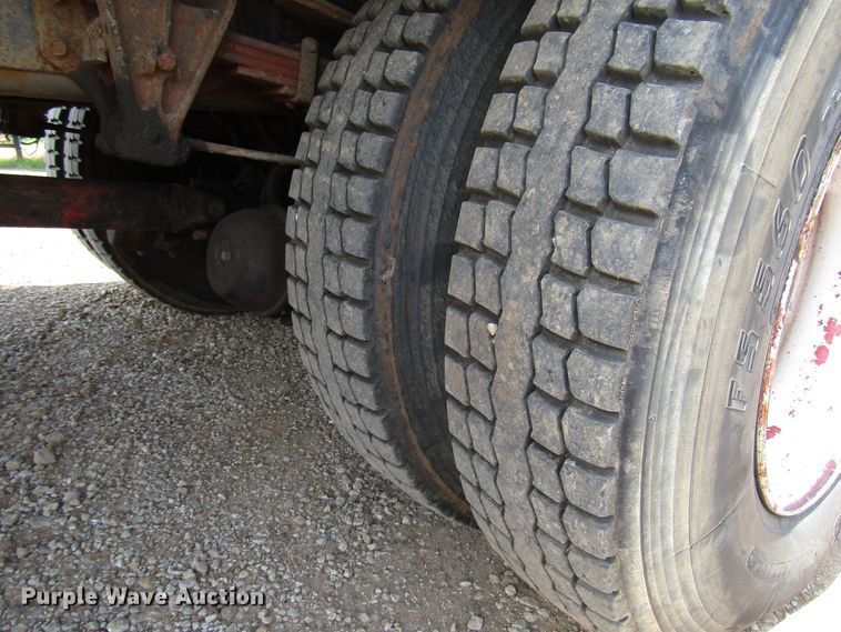 image for item DG1280 2000 International 4900 chipper truck