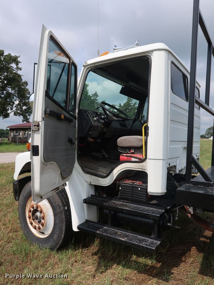 image for item DG4028 1996 Freightliner FL70 flatbed truck