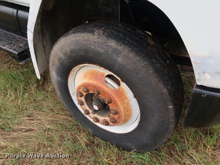 image for item DG4028 1996 Freightliner FL70 flatbed truck