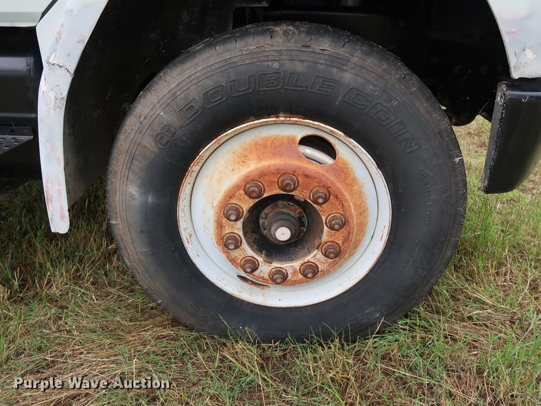 image for item DG4028 1996 Freightliner FL70 flatbed truck