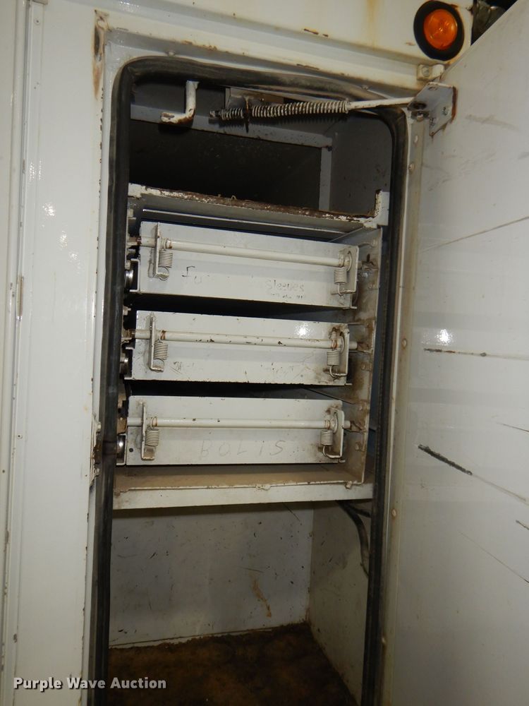 image for item DG4770 2000 Sterling LT7500 digger derrick truck