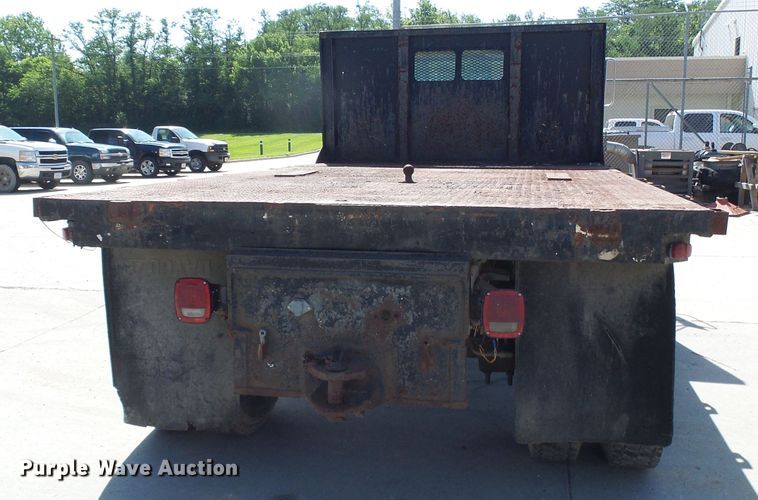 image for item DI0499 1995 Ford F700 flatbed truck