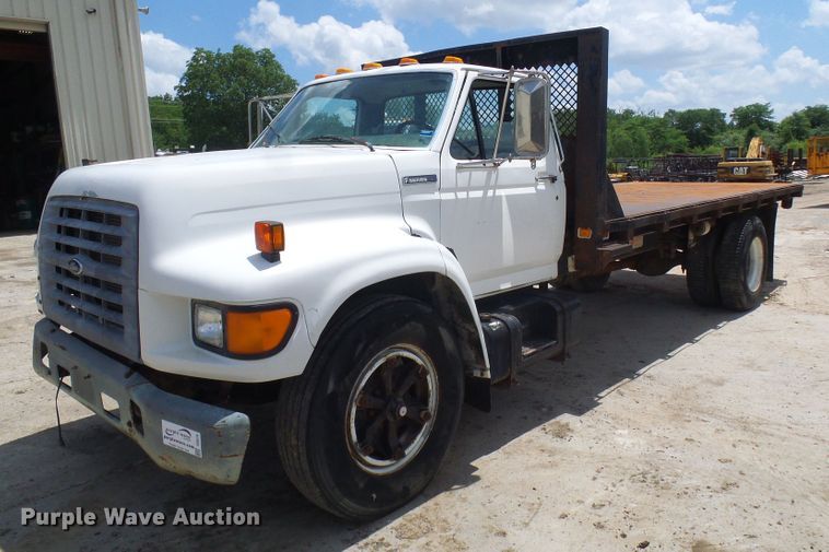 image for item DI0519 1997 Ford F700 dump flatbed truck
