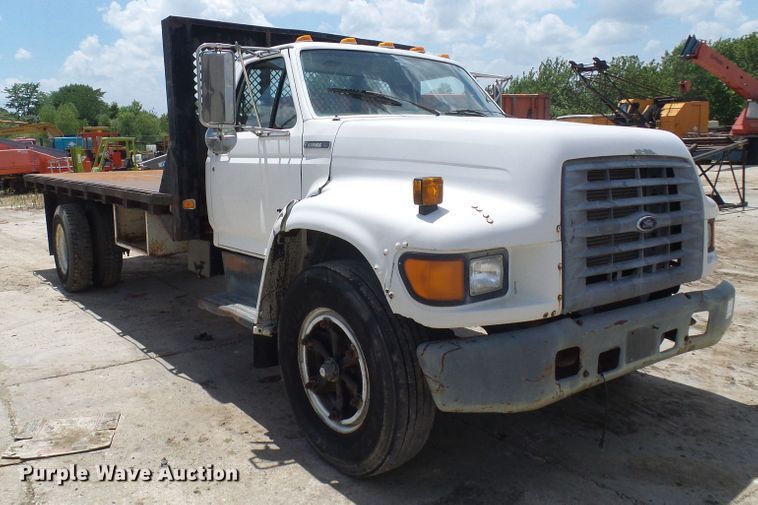 image for item DI0519 1997 Ford F700 dump flatbed truck