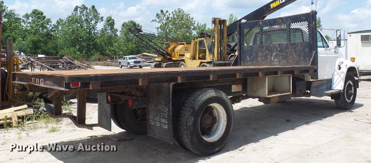 image for item DI0519 1997 Ford F700 dump flatbed truck