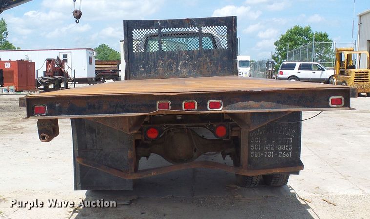 image for item DI0519 1997 Ford F700 dump flatbed truck